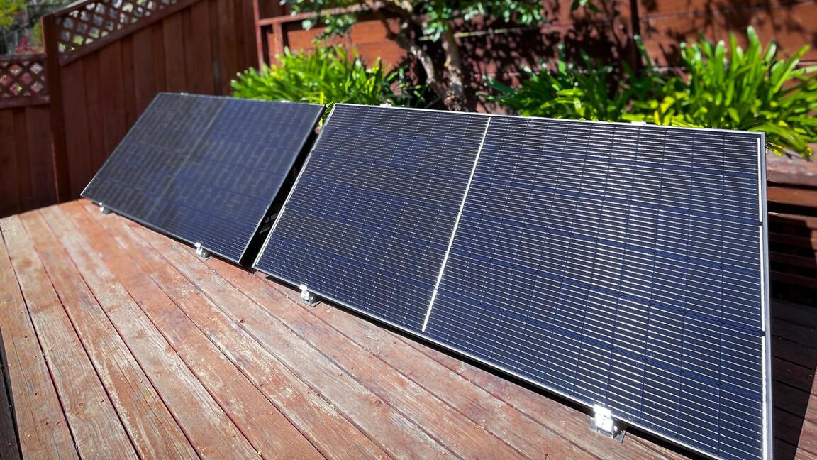Plug-in solar panels sitting on a deck